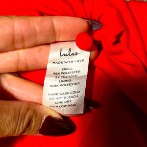 Lulus red sleeveless dress with slit and a cute bow on one sleeve.